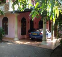 Two storied house with 4 bed rooms and two bathrooms!!has a land area of 12 perches including the ga